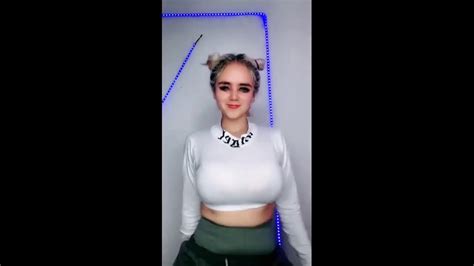In a viral TikTok video Friday, Billie Eilish had a casual wardrobe malfunction with her “titties falling out.” Unabashed, the 19-year-old singer continued p...
